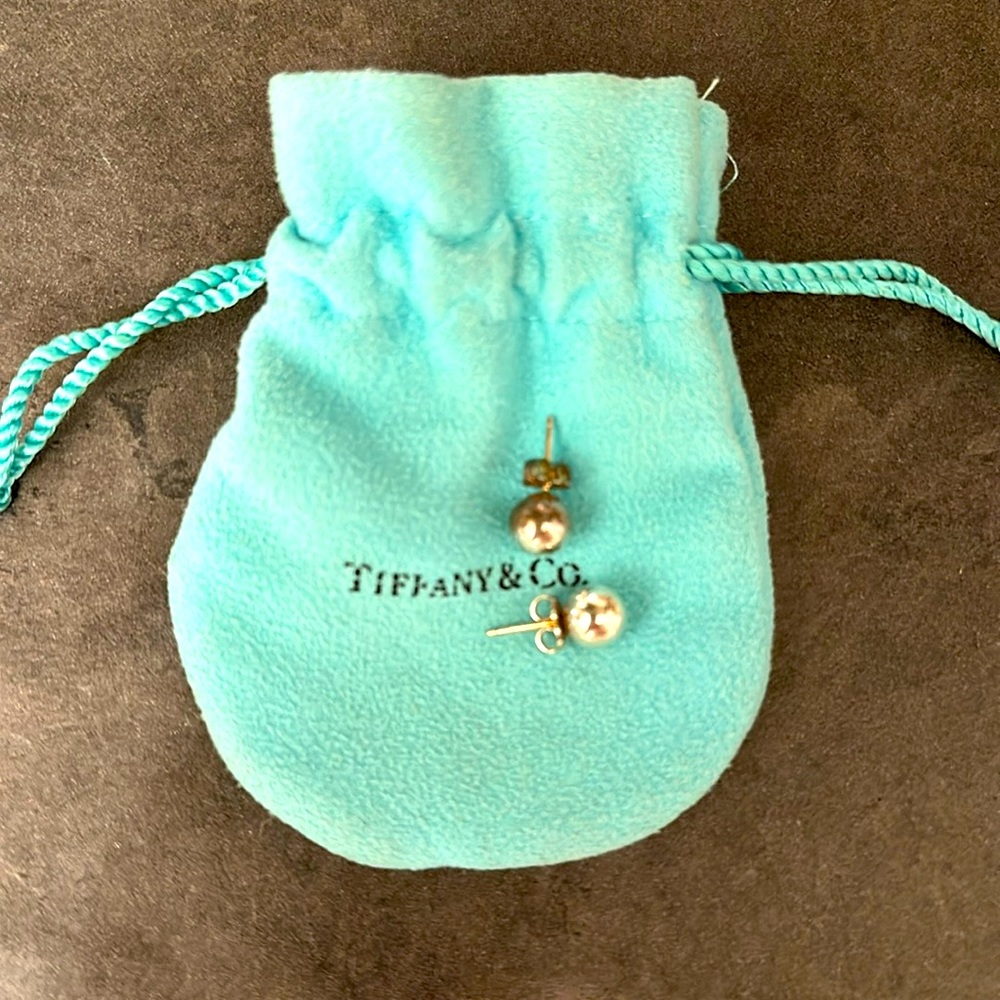 Classic Tiffany ball earrings, barely used.  Great condition